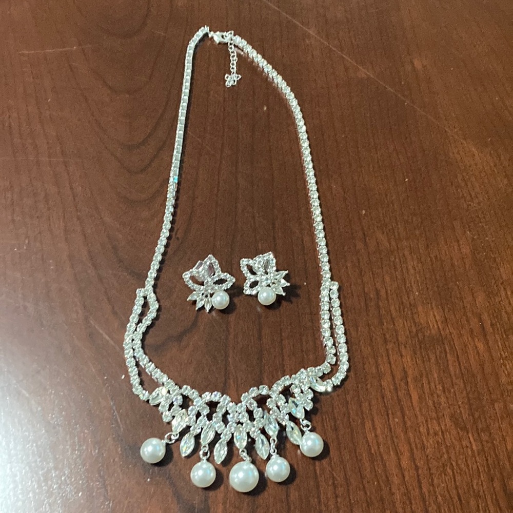 Silvertone and Pearl Necklace and Earring Set
Buy 1 get 2 free. Mix & match.